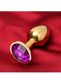 Золотистая анальная пробка с фиолетовым кристаллом - Сима-Ленд - купить с доставкой в Новосибирске