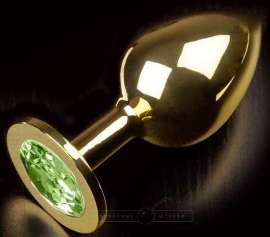 Золотистая анальная пробка с салатовым кристаллом - 9 см. - Пикантные штучки - купить с доставкой в Новосибирске