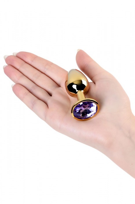 Золотистая коническая анальная пробка с фиолетовым кристаллом - 7 см. - ToyFa - купить с доставкой в Новосибирске