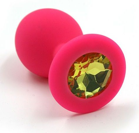 Розовая силиконовая анальная пробка с жёлтым кристаллом - 7 см. - Kanikule