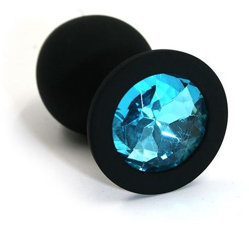 Чёрная силиконовая анальная пробка с голубым кристаллом - 7 см. - Kanikule - купить с доставкой в Новосибирске